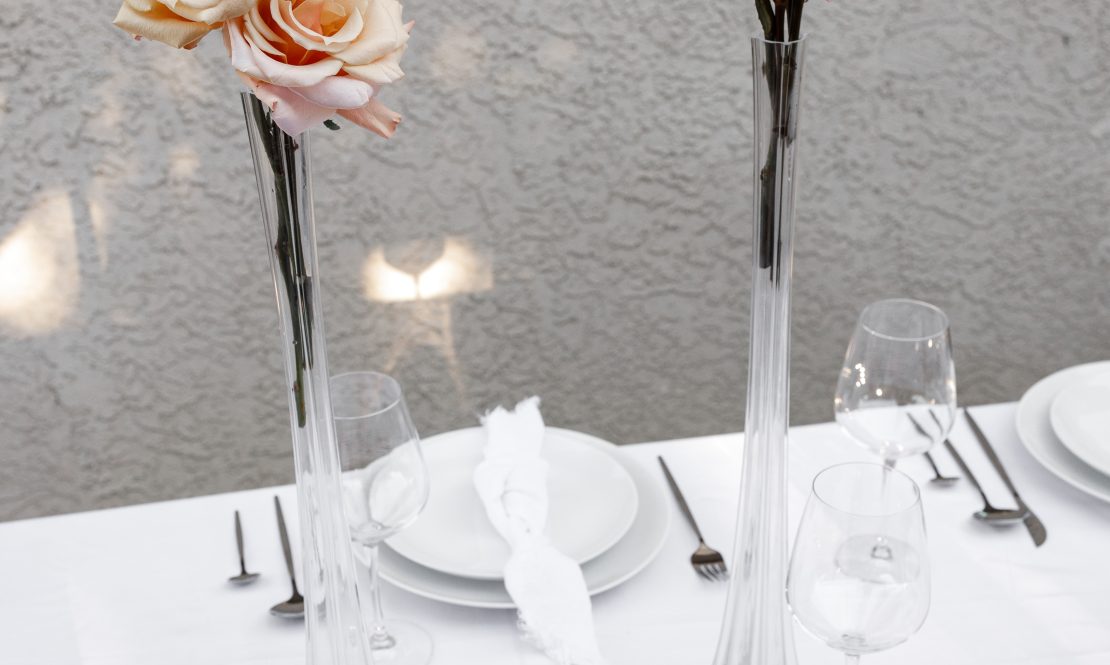 Slender, tall, clear compositional vases rental Sacramento CA | Rent4.Party