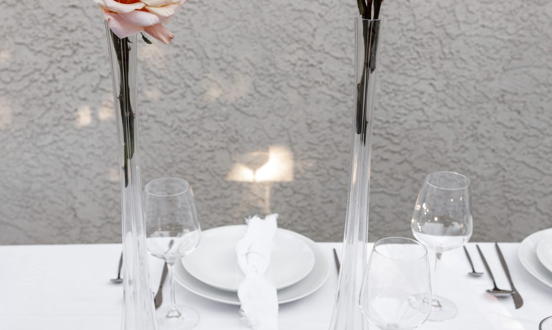Slender, tall, clear compositional vases rental Sacramento CA | Rent4.Party
